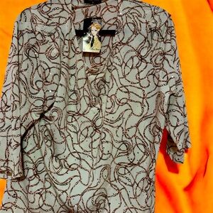 Crème with gold swirly glitter pattern long sleeve blouse